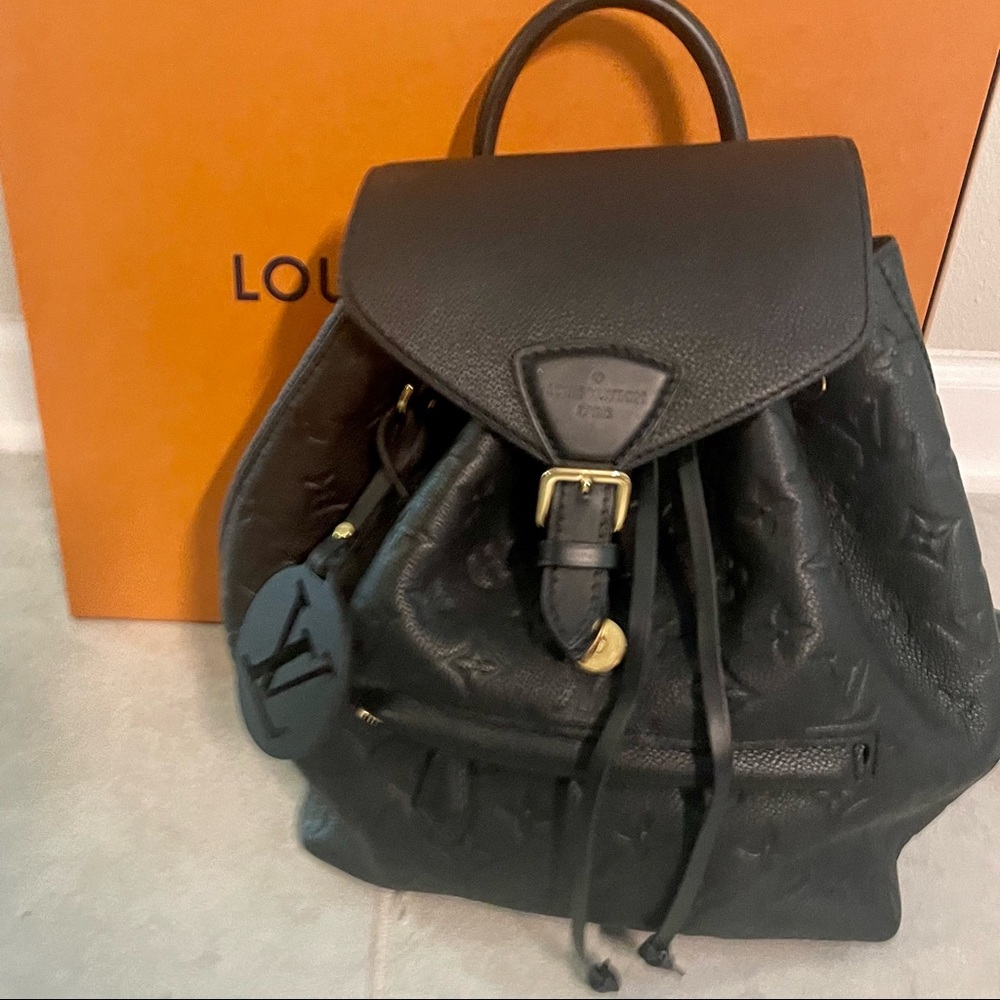 Authentic Louis Vuitton Montsouris backpack monogram imprint  leather PM